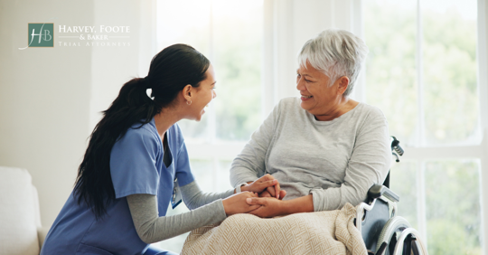 image of nursing home staff and patient laughing