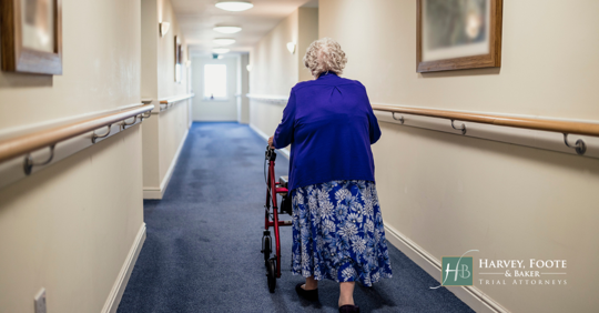 Nursing home patient walking down hallway